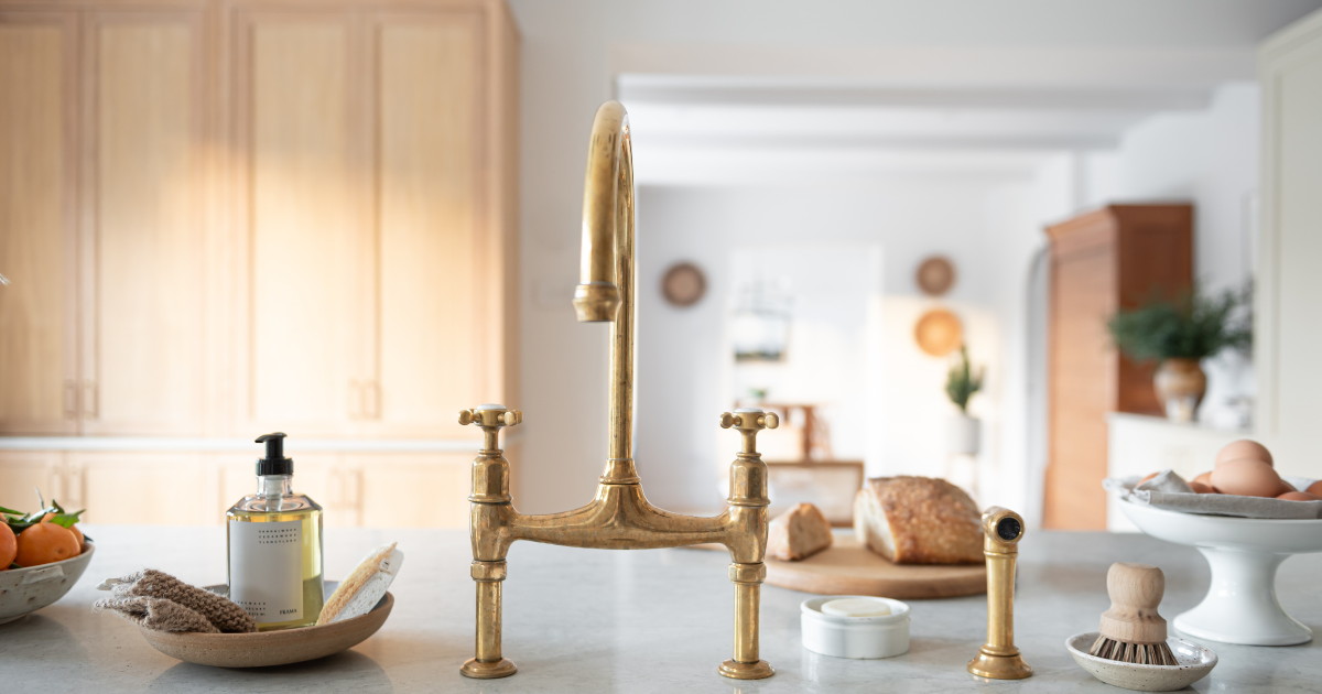 Ionian Bridge Sink Mixer with Rinse in Aged Brass (Shere Kitchens, Julia Currie Photography)