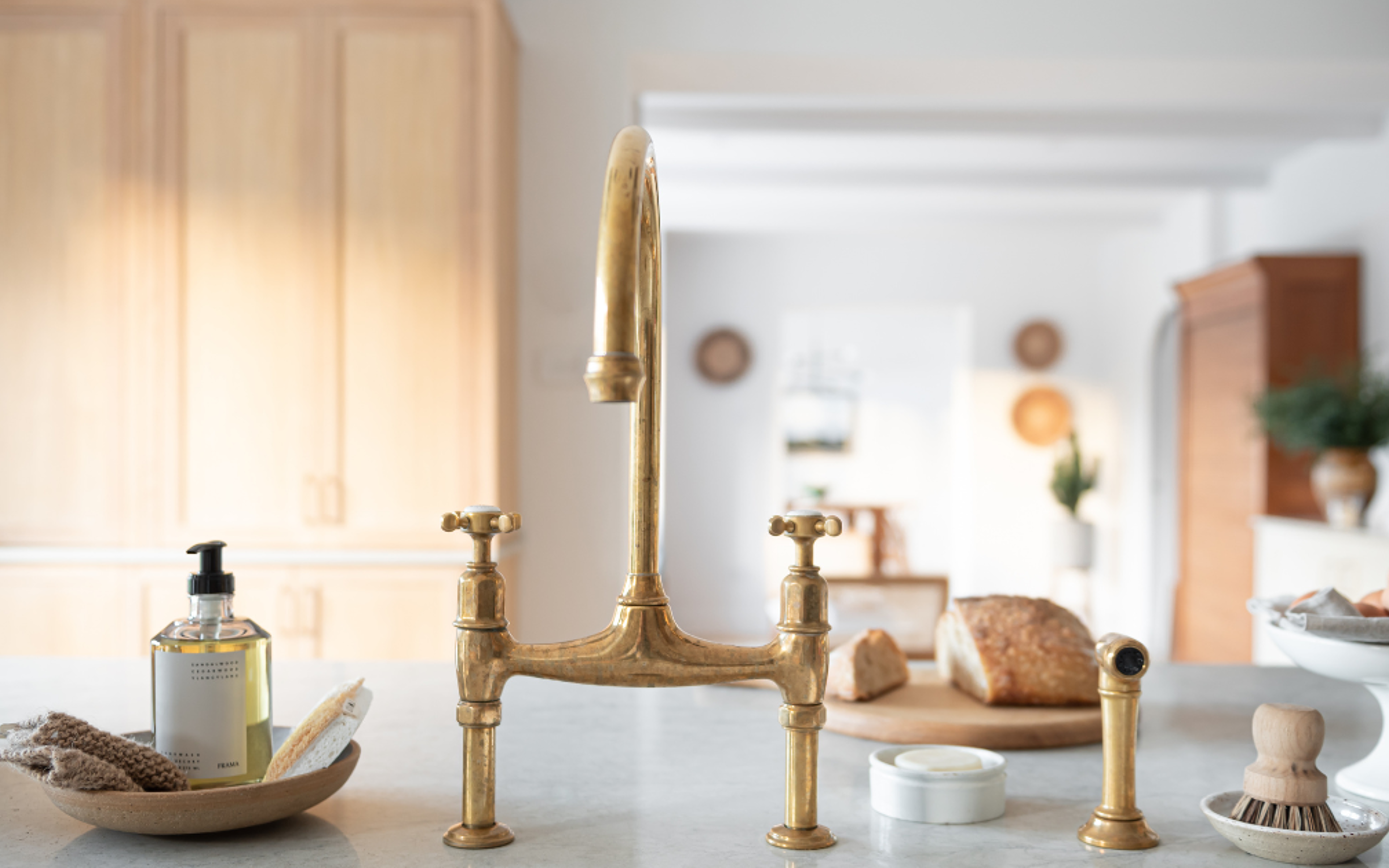 Ionian Bridge Sink Mixer with Rinse in Aged Brass (Shere Kitchens, Julia Currie Photography)
