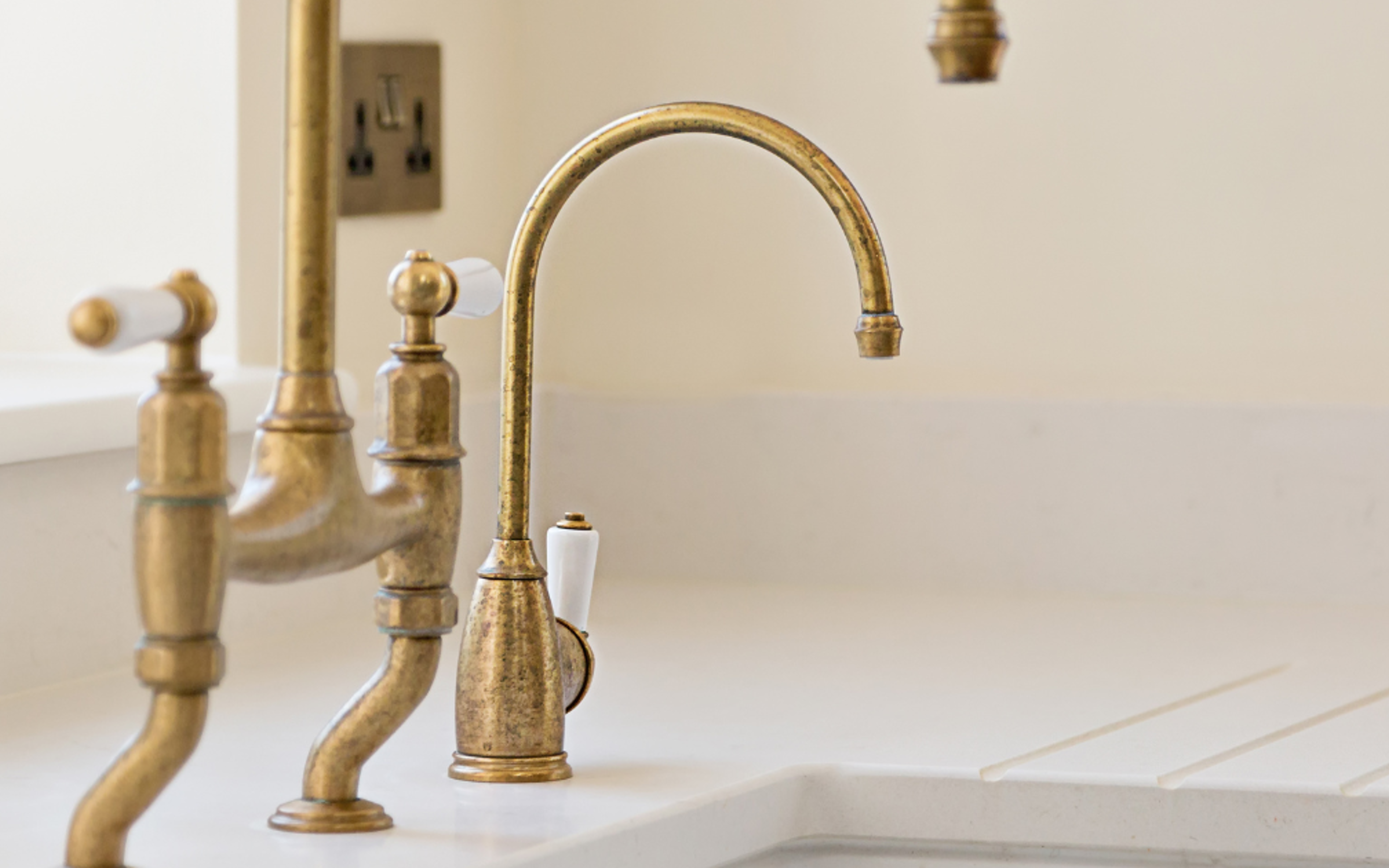 Ionian Bridge Sink Mixer and Rinse in Aged Brass (Francie Readman Interiors, Cristina Granena Photography)